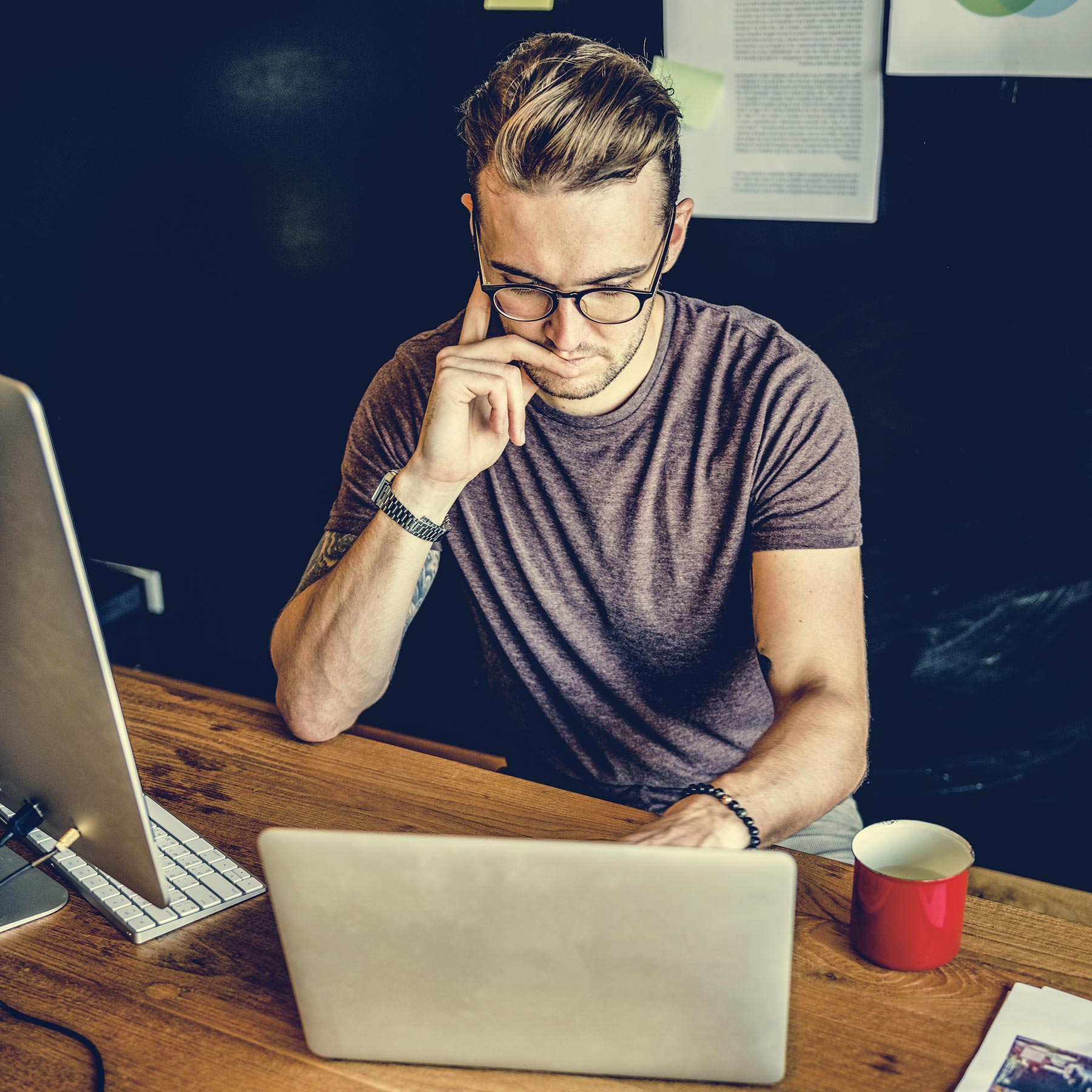 man-busy-photographer-editing-home-office-concept-PWSESWA.jpg