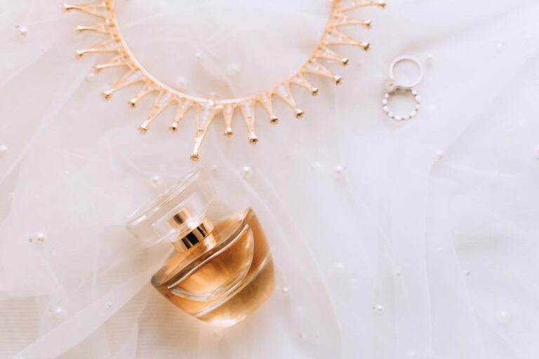 flatlay-of-bridal-details-on-wedding-day-perfume-e-2024-10-14-11-02-26-utc