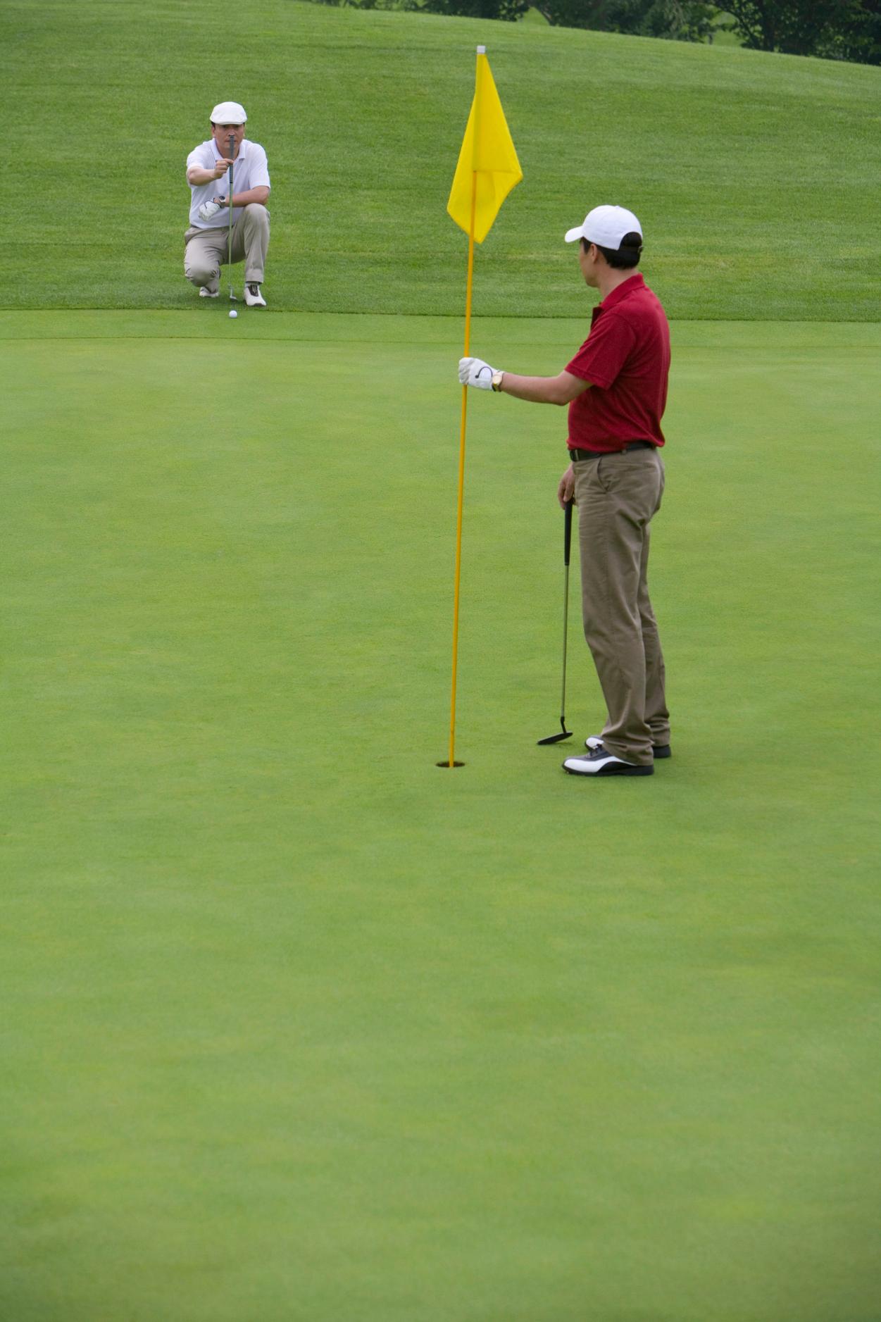 two-golfers-on-the-green-2023-11-27-05-23-55-utc