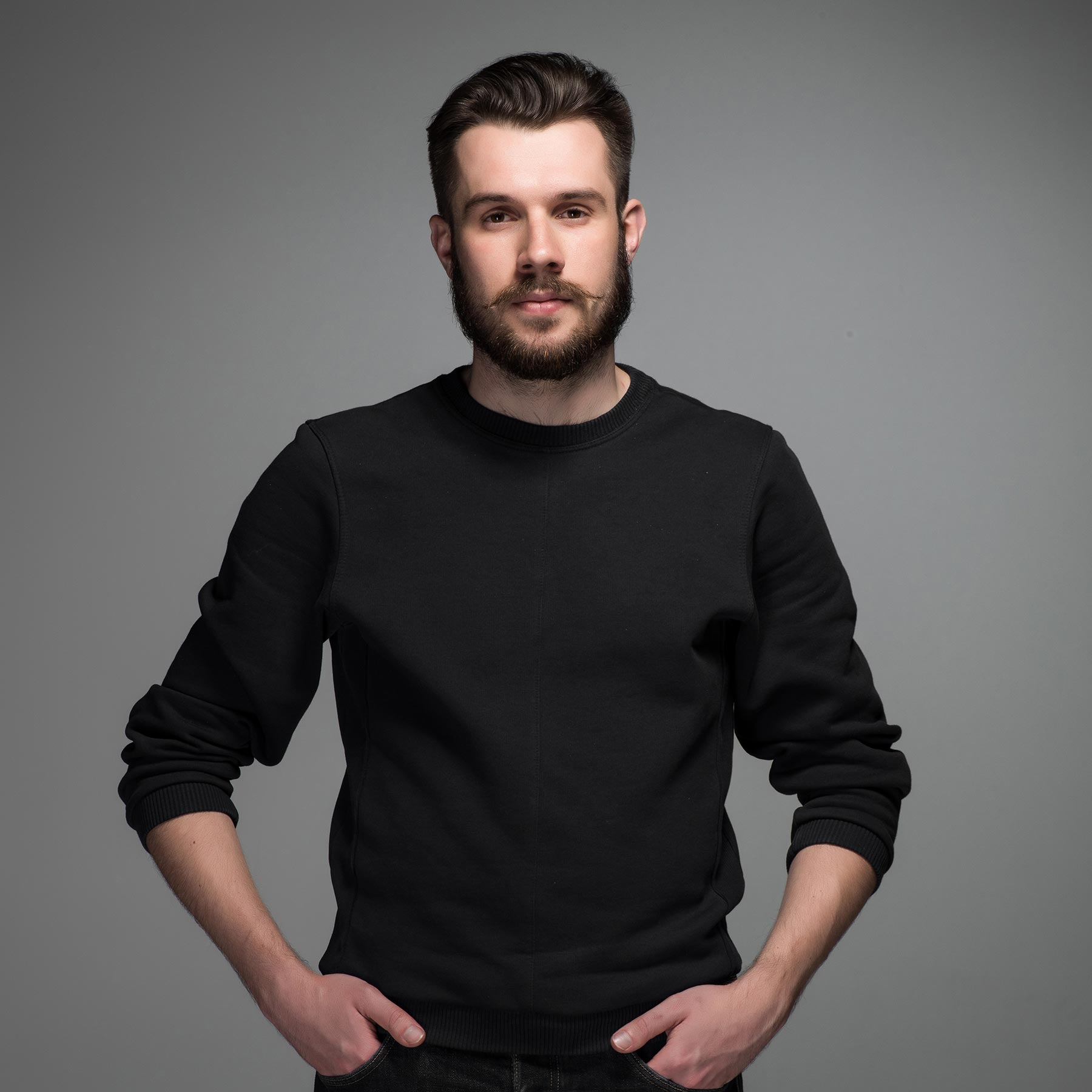 fashion-portrait-of-young-man-in-black-PRRGJWK.jpg